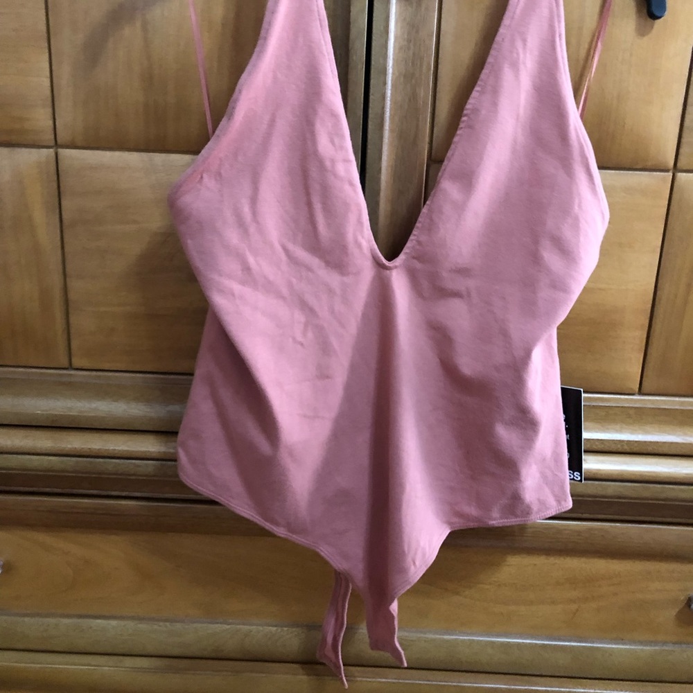 Peach body suit